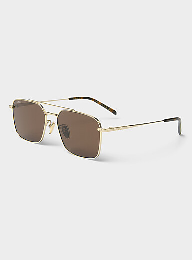 Les lunettes de soleil aviateur dor&eacute;es
