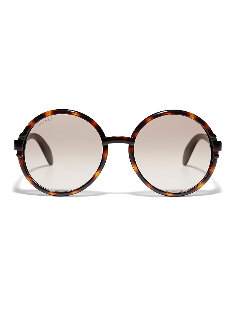 Gucci: Les lunettes de soleil rondes écailles de tortue Brun pour femme