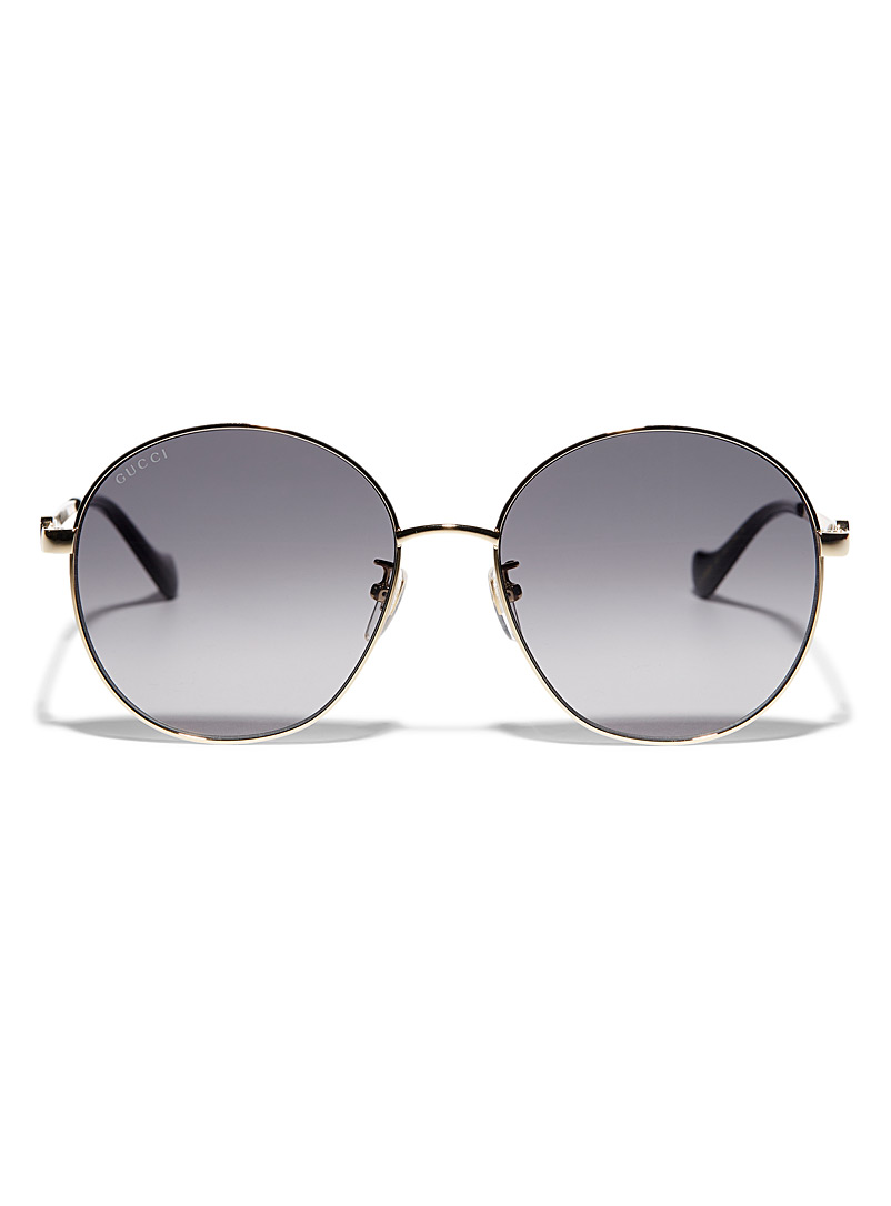 Gucci: Le lunettes de soleil rondes à monture dorée Gris pour femme