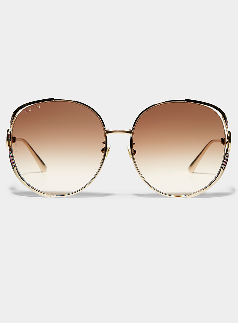 Gucci: Les lunettes de soleil rondes branches ajourées Argent pour femme