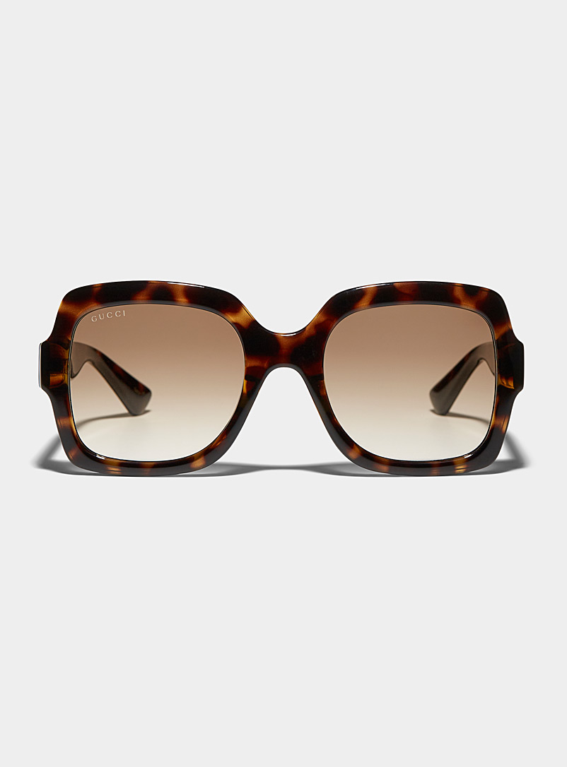 Gucci: Les lunettes de soleil carrées monogramme doré Brun à motifs pour femme