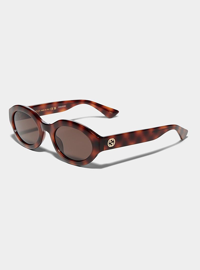 Gucci: Les lunettes de soleil ovales griffées écaille de tortue Taupe pour femme