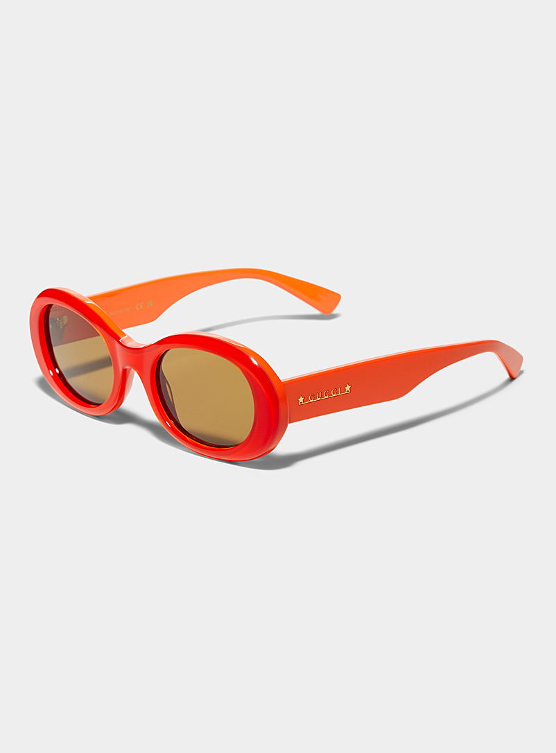 Gucci: Les lunettes de soleil ovales orange électrique Rouge pour femme