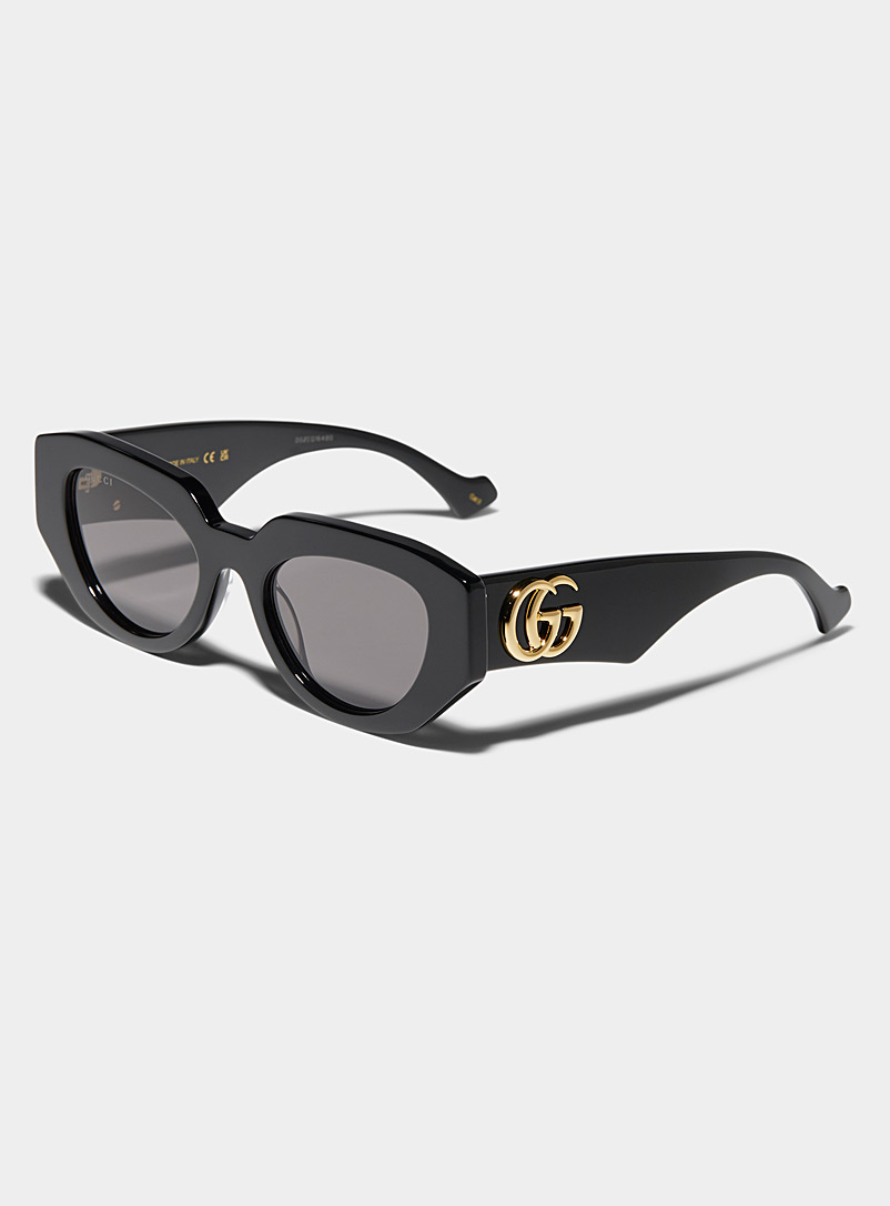 Gucci: Les lunettes de soleil anguleuses monogramme doré Noir pour femme