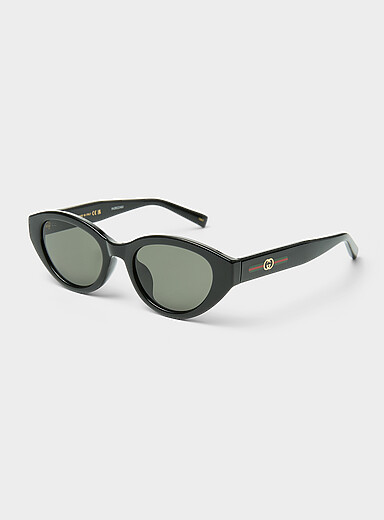 Les lunettes de soleil ovales rayures signature