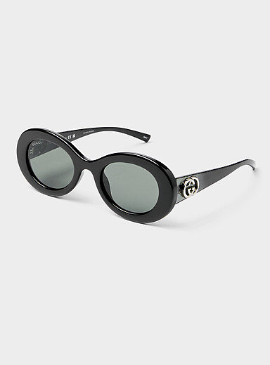 Les lunettes de soleil ovales logo argent&eacute;