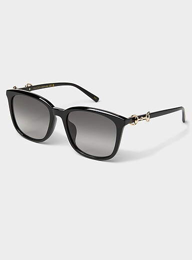 Les lunettes de soleil carr&eacute;es branches ornement&eacute;es
