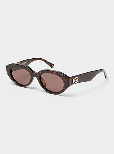 Les lunettes de soleil ovales angulaires