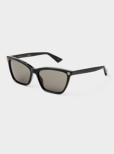 Les lunettes de soleil fines carr&eacute;es logo dor&eacute;