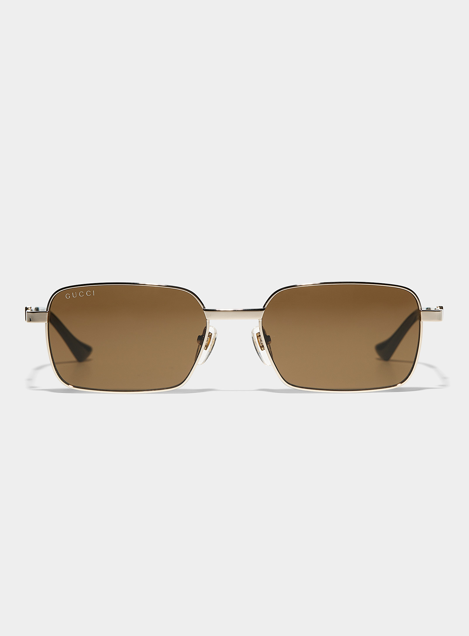 Gucci Sleek Metallic Sunglasses In Gold