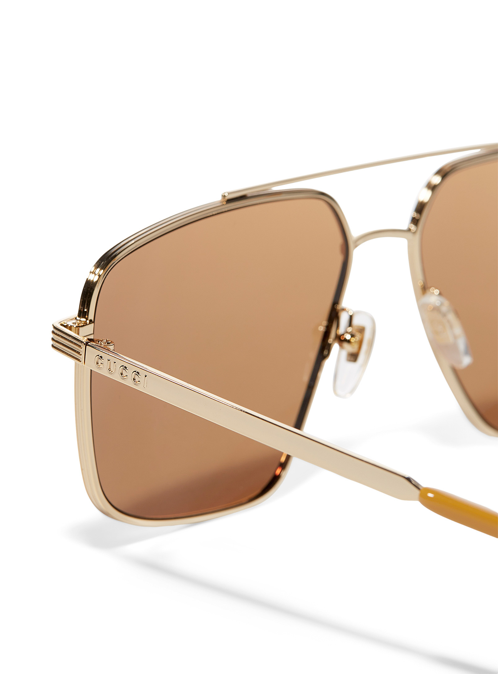 Gucci - Les lunettes de soleil aviateur géo métal doré