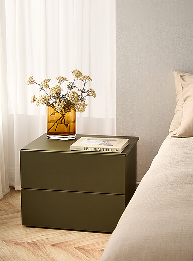 Coloured sleek bedside table