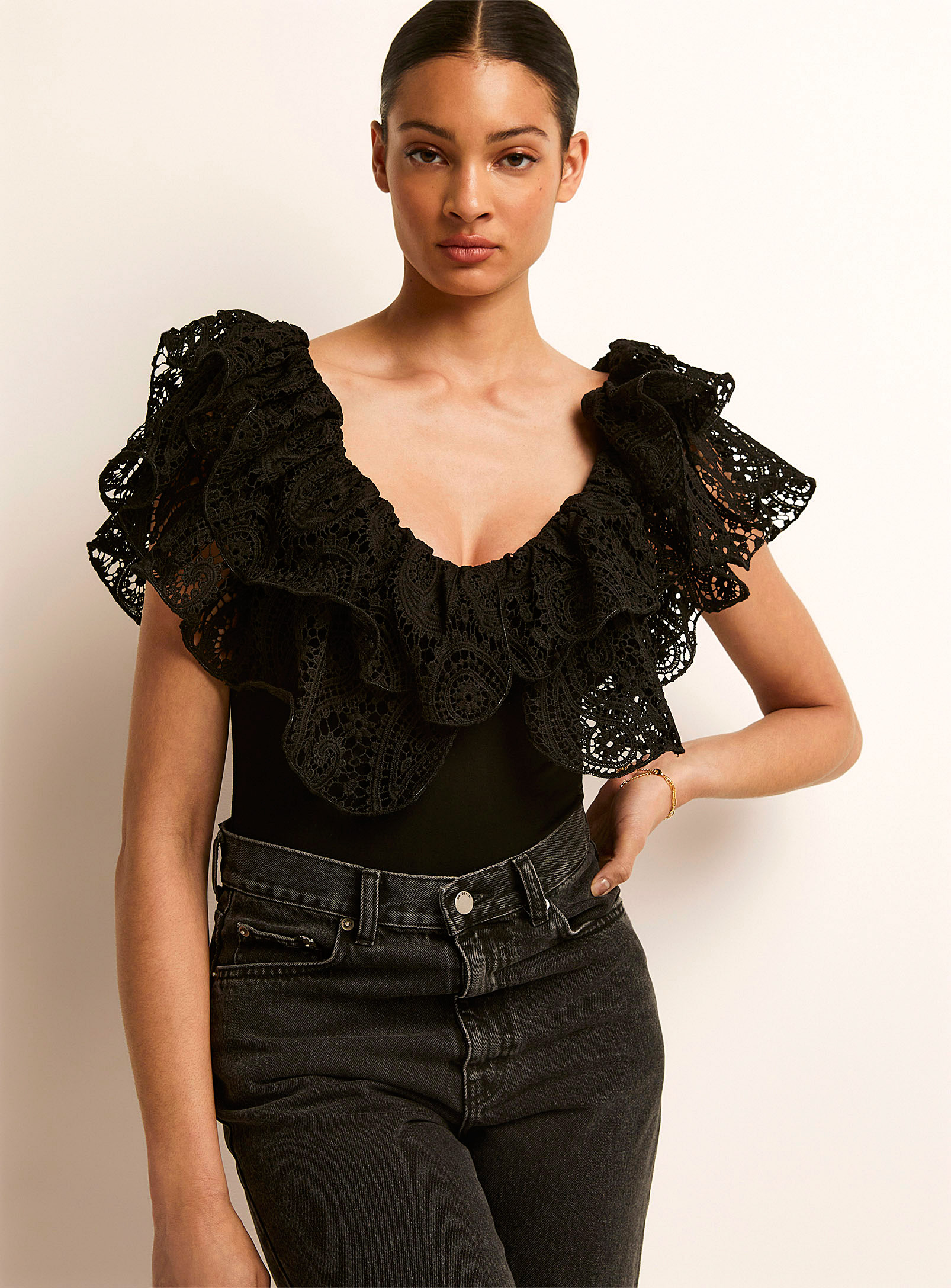 Icone Lace Ruffle Off-the-shoulder Bodysuit In Black