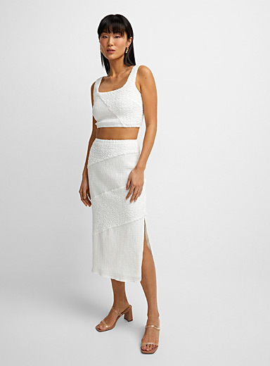 Icône: La jupe midi texturée Blanc pour femme
