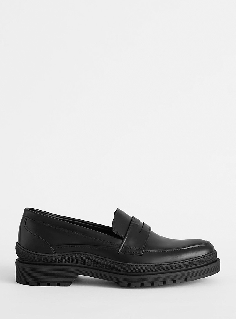 WANT Les Essentiels Black Grave notched-sole penny loafers Women for error