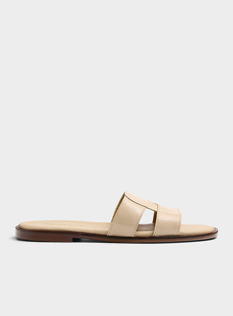 Simons: La sandale coussin&eacute;e cuir entrecrois&eacute; <b>Faite en Espagne</b> Noir pour femme