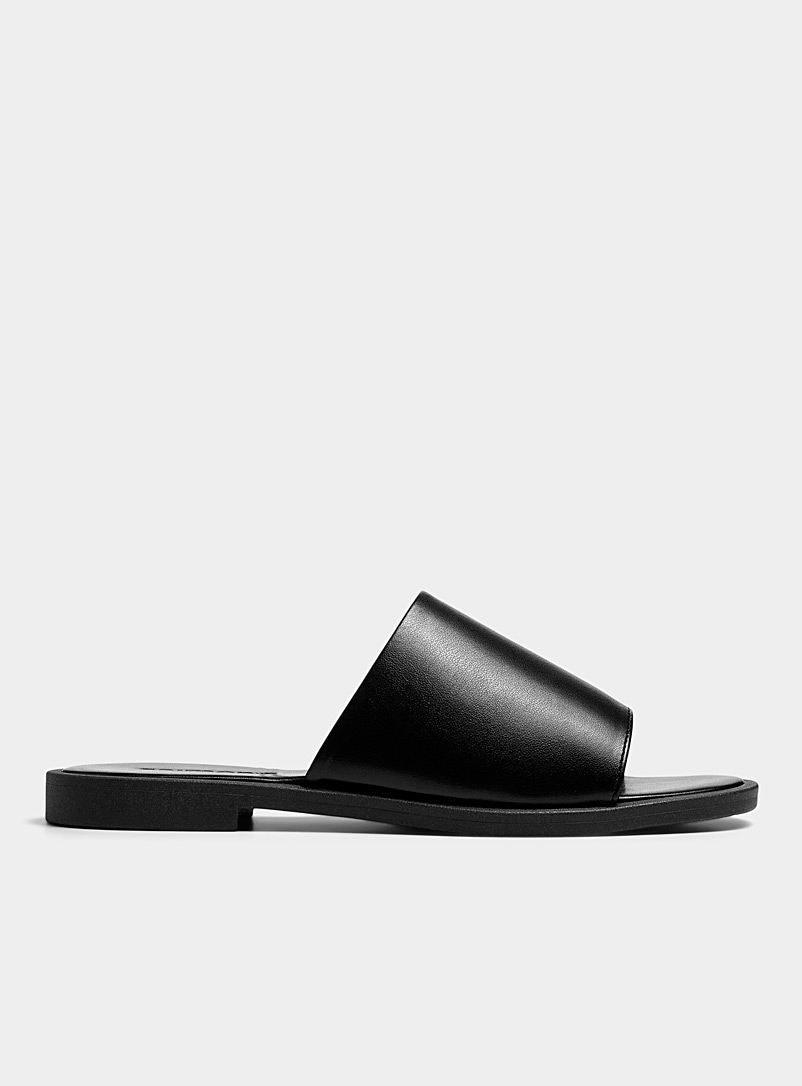 Simons: La sandale slide minimaliste Noir pour femme