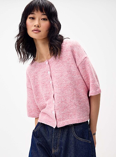 Le cardigan court tricot duveteux