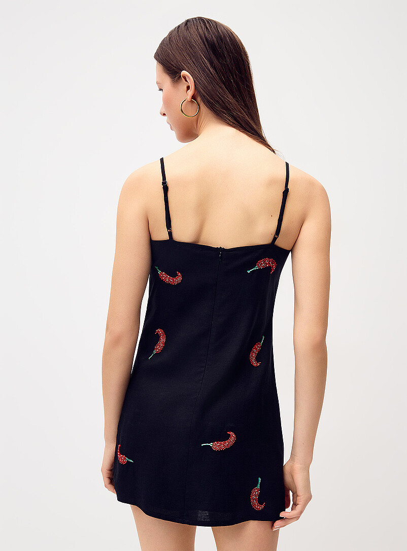 Twik Black Beaded peppers minidress for women