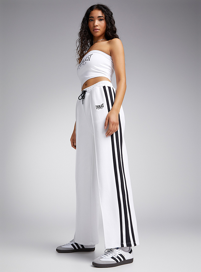 Coney Island Picnic: Le pantalon <i>track</i> à rayures Blanc pour femme