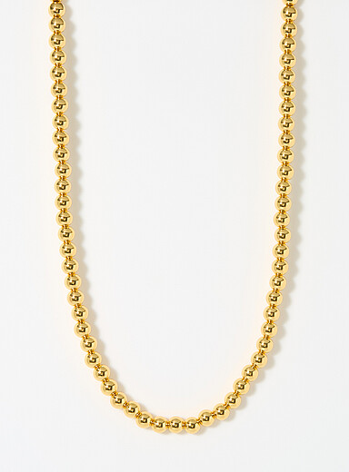 Le collier dor&eacute; &agrave; billes