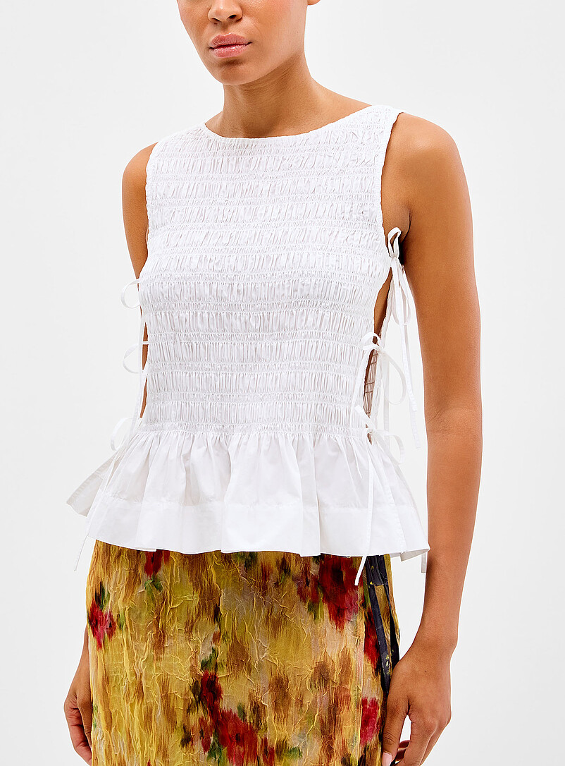 Knots and ruffles smocked blouse product image (primary)