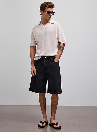Black denim jort <b>Inseam: 11" (28 cm)</b>