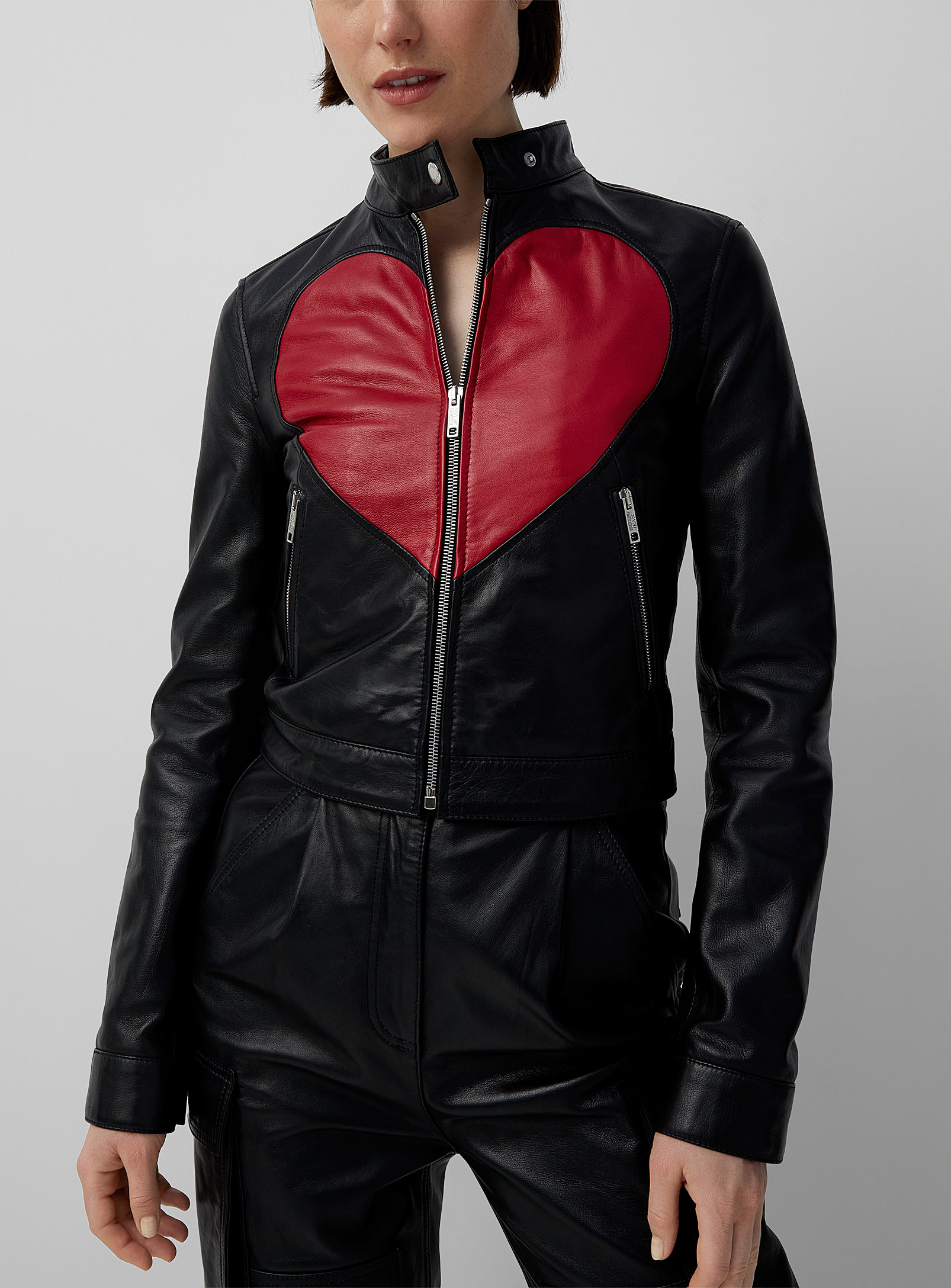 Leather jacket with lace top and cargo pants date night