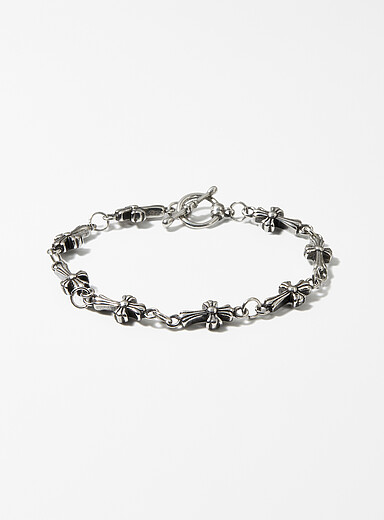 Le bracelet croix r&eacute;p&eacute;t&eacute;es
