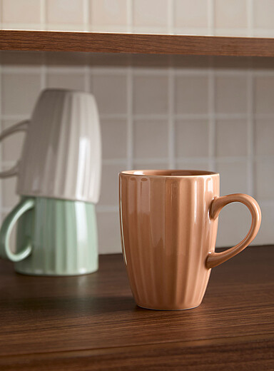 La tasse larges rainures relief