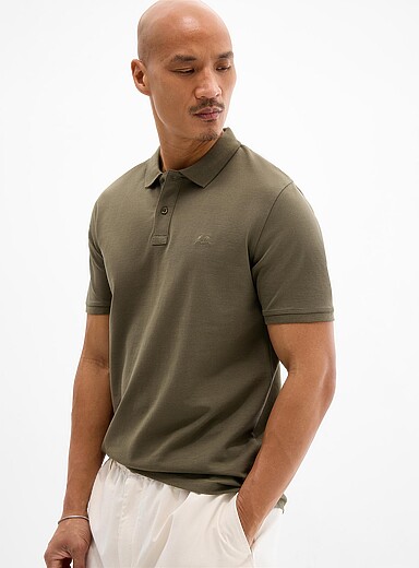 Le polo maille piqu&eacute;e extensible