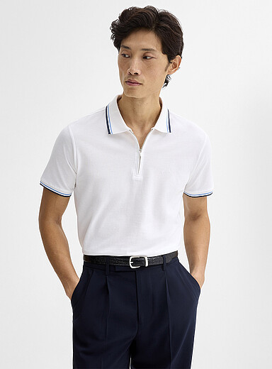 Le polo col zipp&eacute; bordures ray&eacute;es