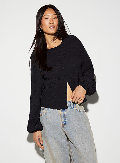 Smocked puff-sleeve buttoned blouse
