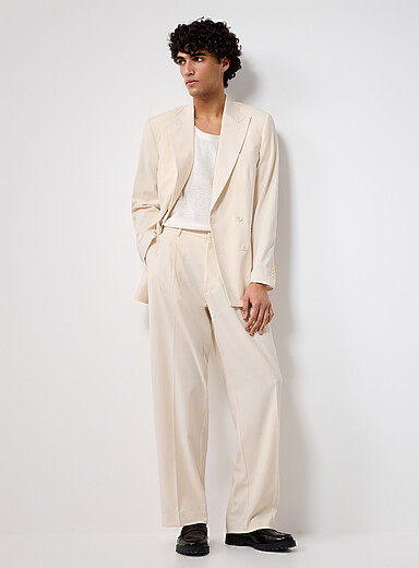Le pantalon double plis cr&egrave;me <b>Coupe ample</b>