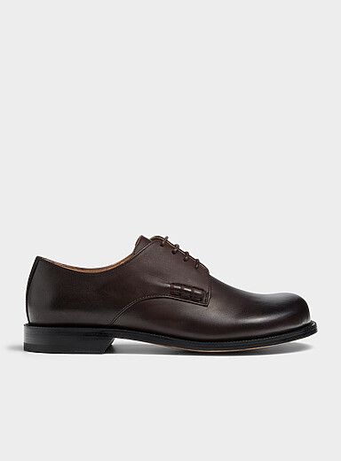 JW Anderson: La chaussure derby en cuir bout large Homme Brun pour homme
