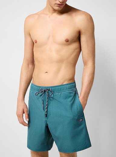 Faded solid swim trunk