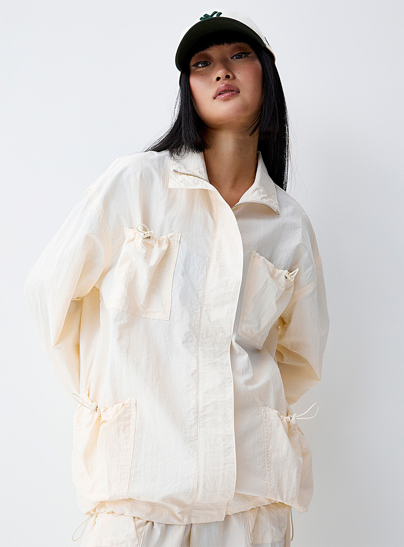 Eladay Off White Toggled pockets loose jacket for women