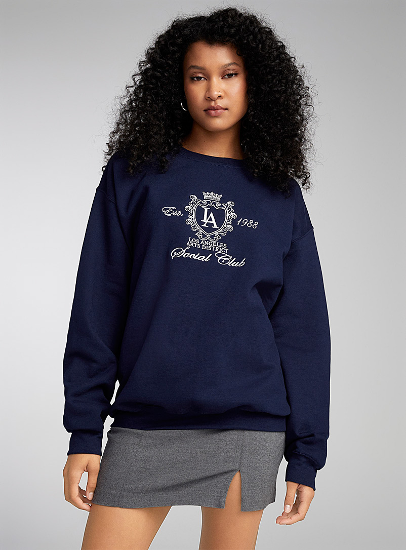 Twik Marine Blue Social Club embroidered crest sweatshirt for women