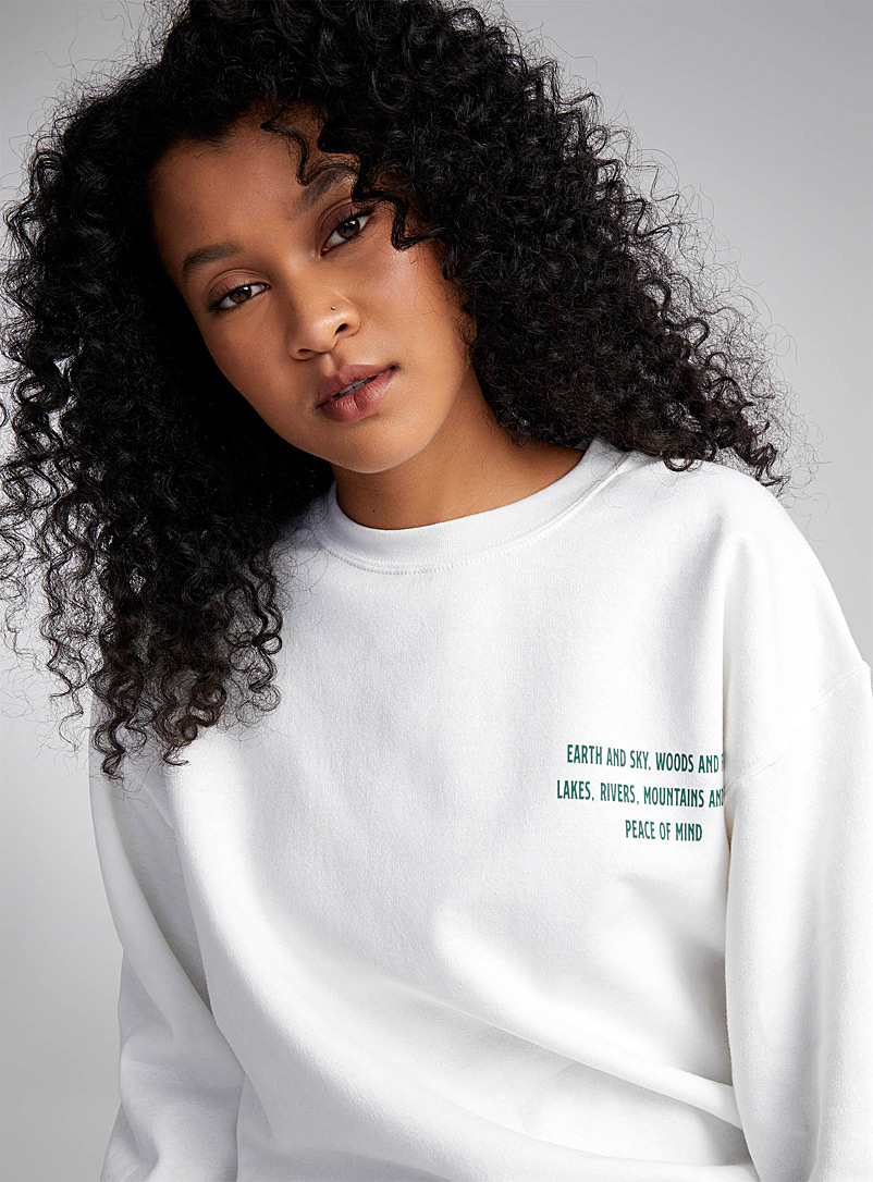 Twik White Quiet forest printed back sweatshirt for women