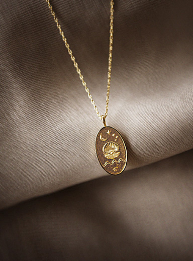 Le collier pendentif signe du zodiaque en or
