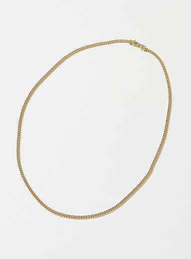 Le collier cha&icirc;ne gourmette fine dor&eacute;