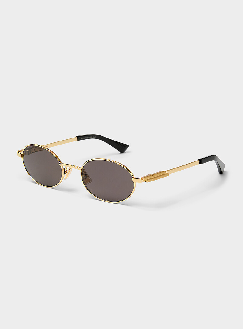 Golden oval sunglasses product image (primary)