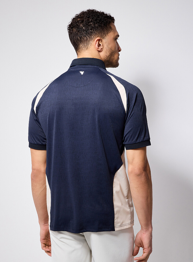 Macade: Le polo de golf trame chin&eacute;e blocs lat&eacute;raux Bleu marine - Bleu nuit pour homme