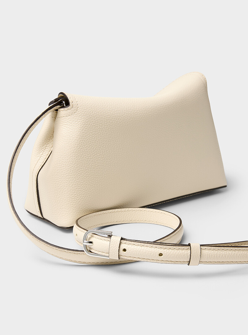 Toteme Ivory/Cream Beige T-Lock grained leather clutch for women