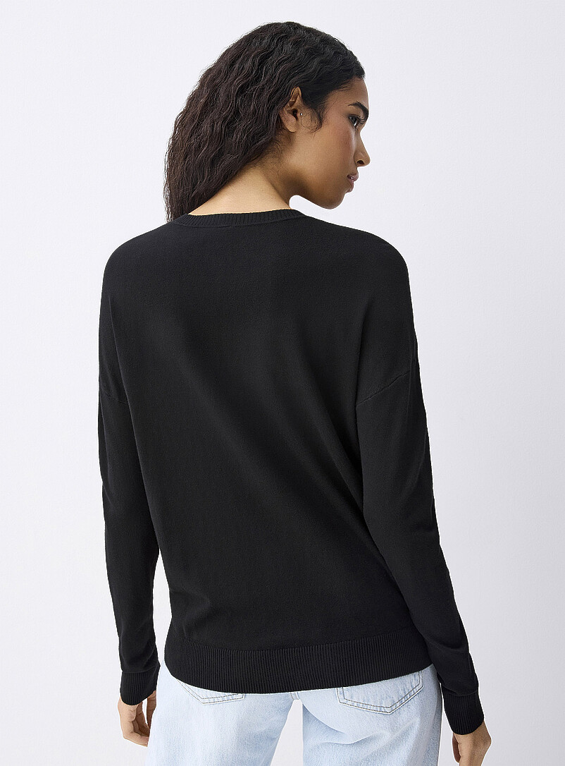 Twik: Le chandail ample col rond Vert assorti pour femme