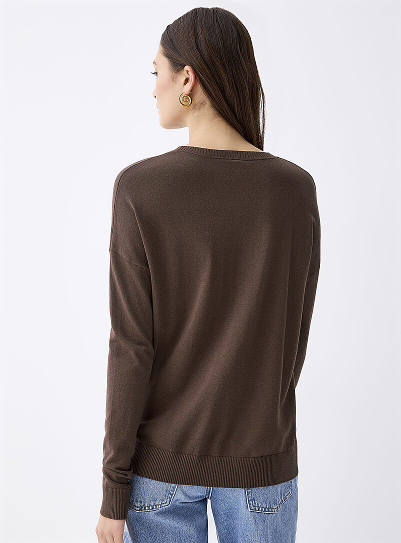 Twik: Le chandail ample col rond Vert assorti pour femme