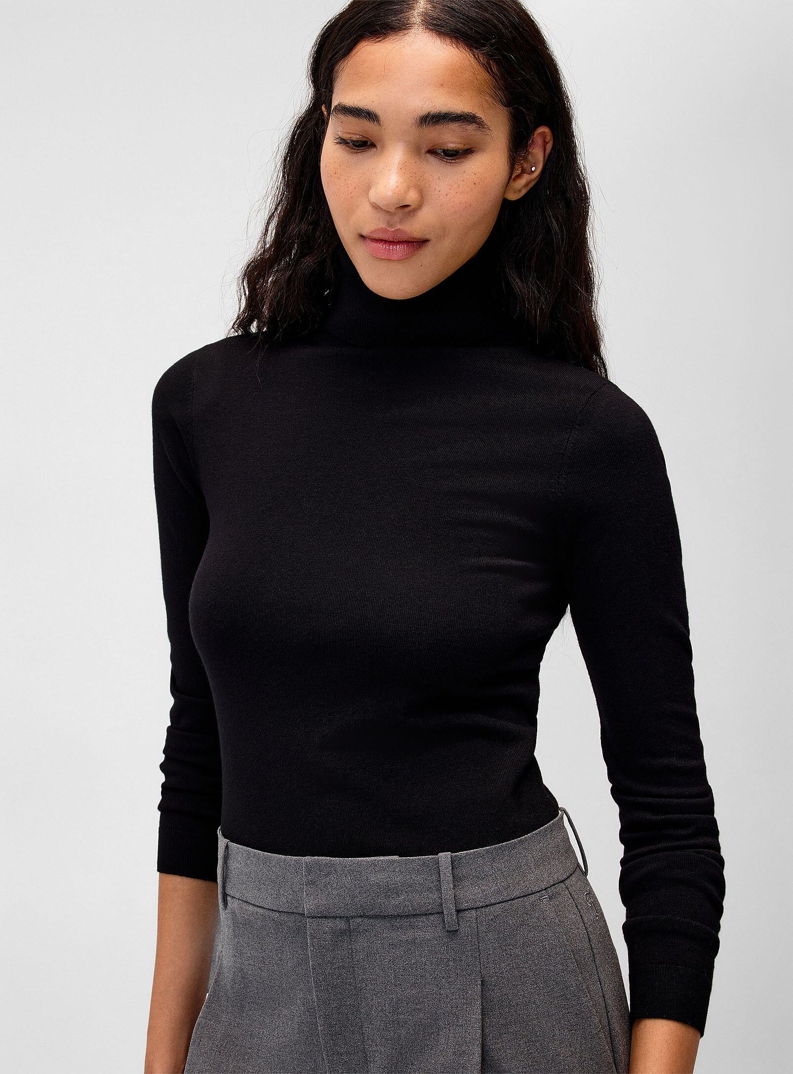 Twik Solid Turtleneck Sweater In Black