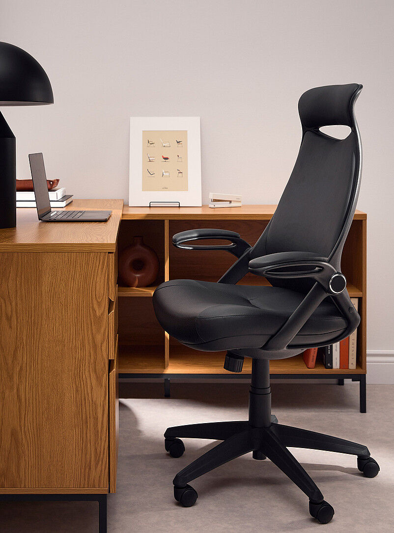 Black faux-leather office chair product image (primary)