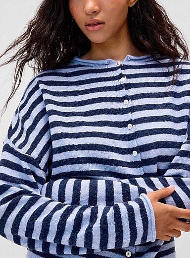 Le cardigan tricot duveteux
