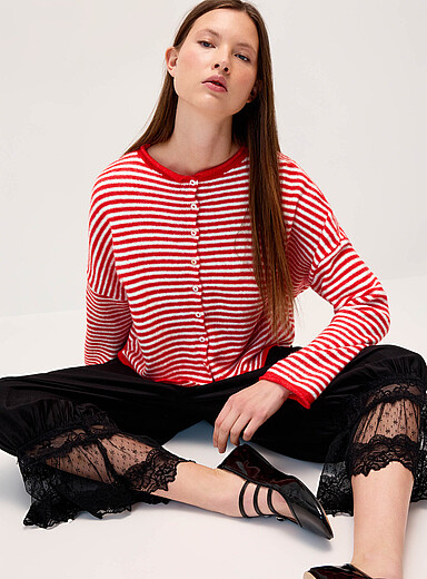 Le cardigan tricot duveteux